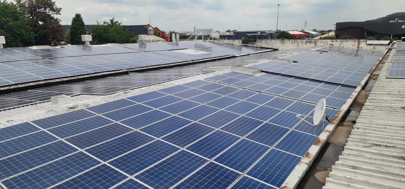Rows of solar panels on a flat roof